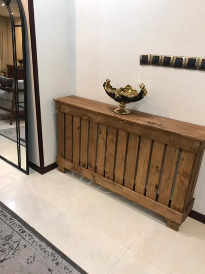 عکس ارسالی مشتری از کاور شوفاژ چوبی در کنج پذیرایی