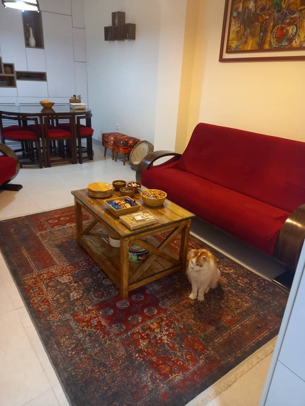 عکس ارسالی مشتری از میز جلو مبلی چوبی در محیط خانه
