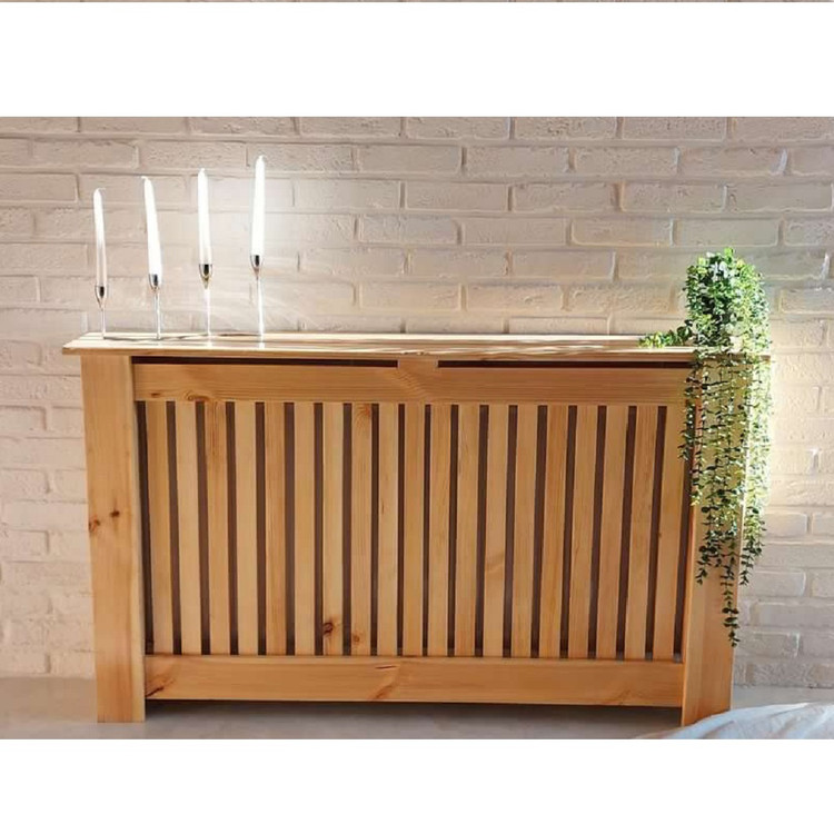 عکس ارسالی مشتری از کاور شوفاژ چوبی با دکور شعمدان