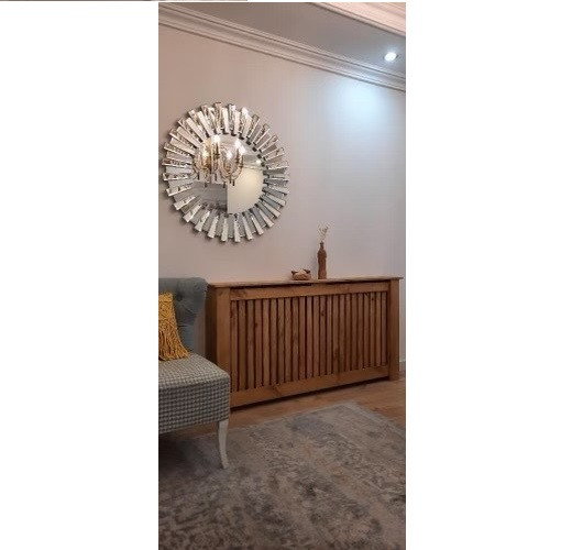 عکس ارسالی مشتری از کاور شوفاژ چوبی در سالن پذیرایی
