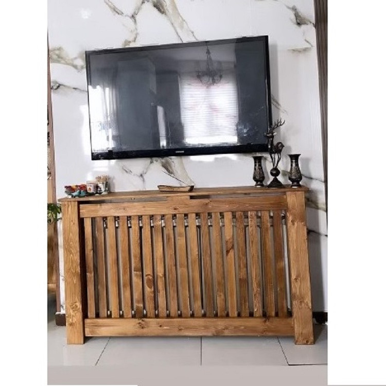 عکس ارسالی مشتری از کاور شوفاژ چوبی زیر تلویزیون