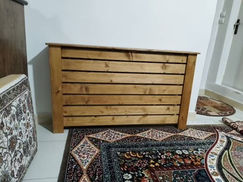عکس ارسالی مشتری از کاور شوفاژ چوبی در محیط خانه
