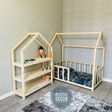 تخت خواب کودک و نوزاد کنار ویترین اتاق کودک