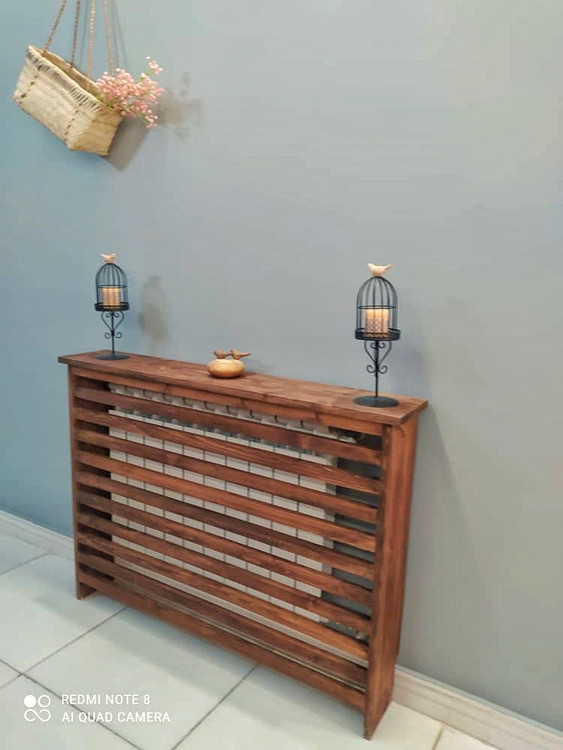 عکس ارسالی مشتری از کاور شوفاژ چوبی در محیط خانه