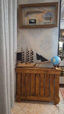 تصویر ارسالی مشتری از کاور شوفاژ چوبی در کنج سالن