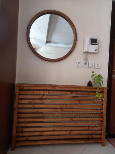 عکس ارسالی مشتری از کاور شوفاژ چوبی با اینه گرد