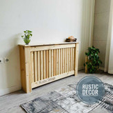 کاور شوفاژ چوبی به رنگ کرم از نمای بغل