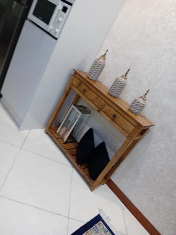 عکس ارسالی مشتری از کنسول چوبی در محیط خانه