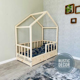 تخت خواب نوزاد کلبه ای کشو دار از نمای بغل