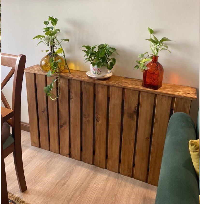 عکس ارسالی مشتری از کاور شوفاژ چوبی در محیط خانه